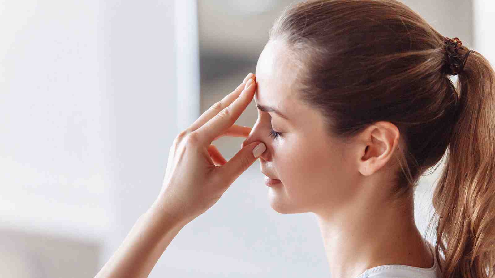 Woman doing breathing exercise